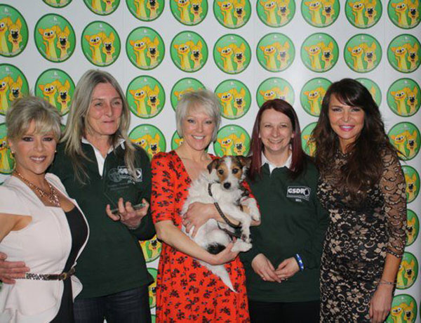 Sam Fox, Helen Chamberlain, Lizzie Cundy present the award to Mel and Jayne from GSDR