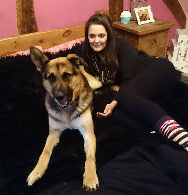 chenko lying on the bed in his foster home